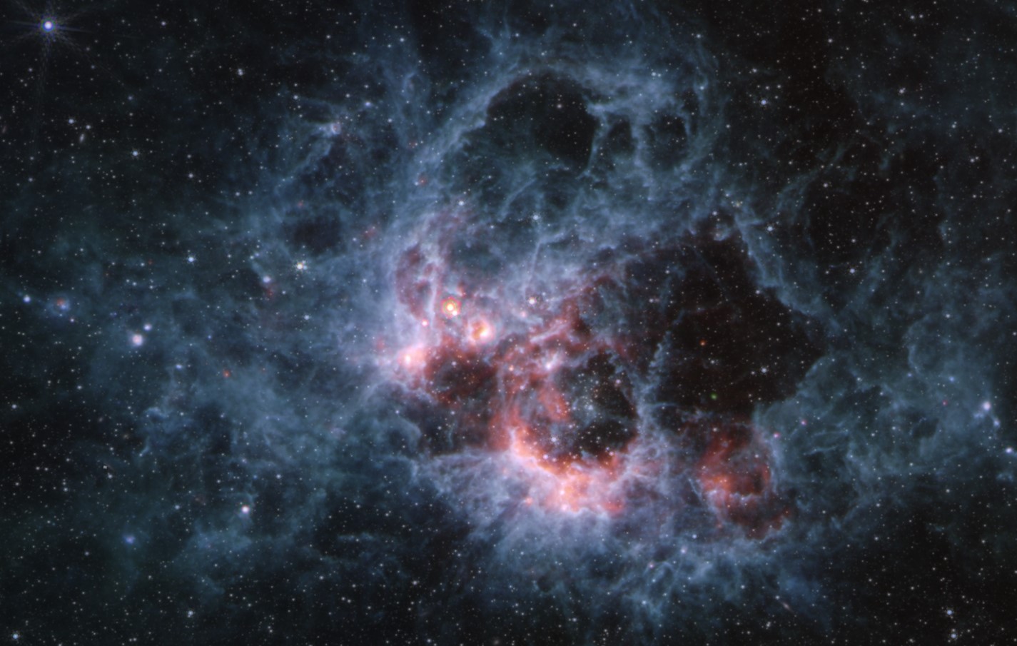 La regione NGC 604 vista dal telescopio Webb con lo strumento MIRI