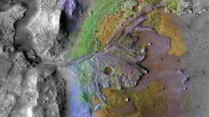 La regione marziana chiamata 'Delta del cratere Jezero', ripresa dall'orbiter Mro della Nasa. I colori sono falsati per evidenziare i diversi minerali. Dall'apparenza è difficile non pensare che una volta qui scorresse un fiume, che ha modellato la superficie(Nasa/Jpl/JHuapl/Msss/Brown University)